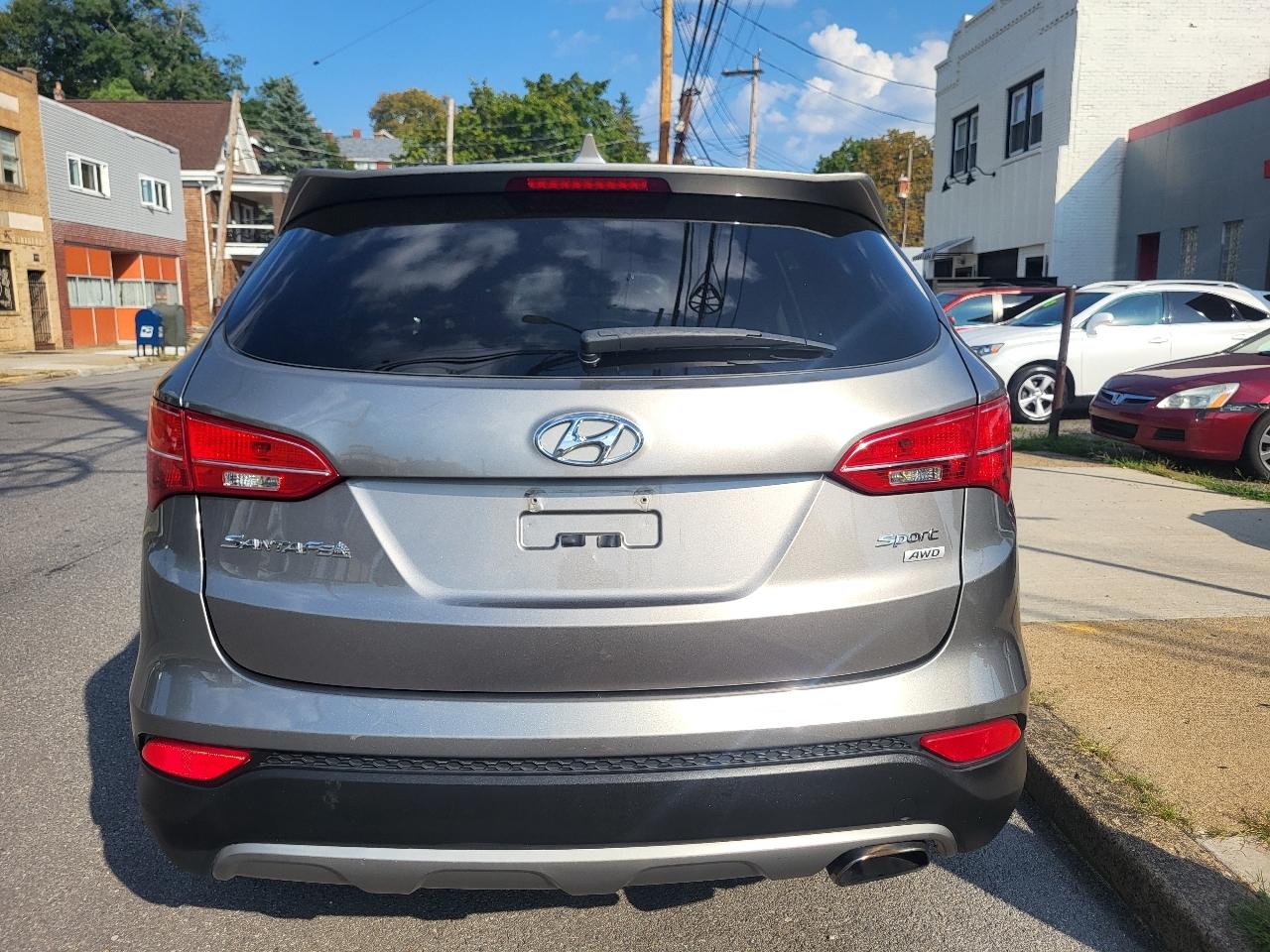 hyundai santa fe 2014 5XYZTDLBXEG166644 image hyundai santa fe 2014 5XYZTDLBXEG166644 image